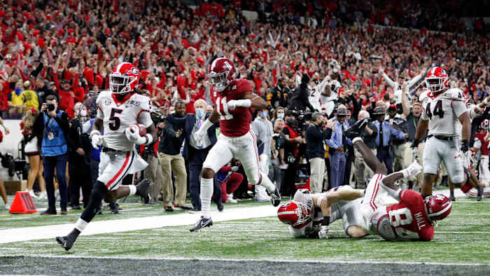 Georgia CB Kelee Ringo (5) puts an exclamation point on Georgia's 33-18 win over Alabama in the 2022 College Football Playoff National Championship Game with a game-sealing pick-six. Photo- Tony